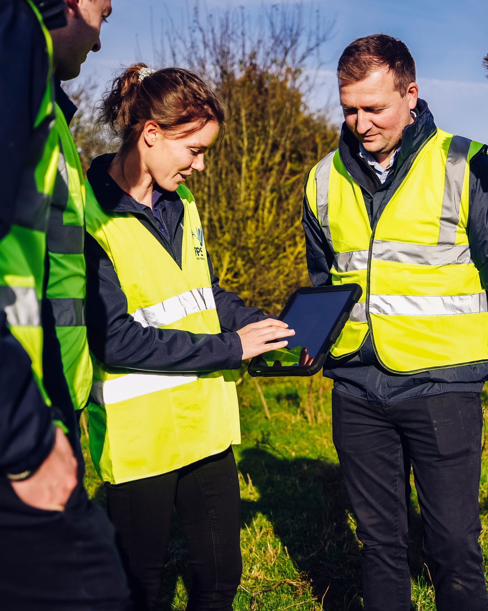 The FPS Environmental team reviewing a site survey outdoors
